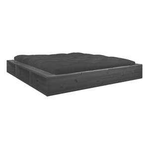 Černá dvoulůžková postel z masivního dřeva s úložným prostorem a černým futonem Comfort Karup Design Ziggy