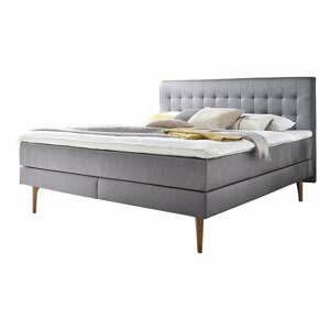 Světle šedá čalouněná dvoulůžková postel s matrací Meise Möbel Massello